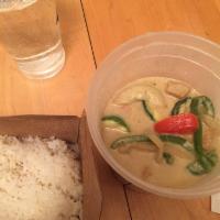 Yellow Curry · A mixture of a light red curry, Madras powder and choice of protein. Served in a coconut mil...