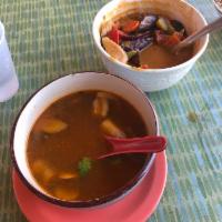 Panang Curry · Choice of protein in a creamy red panang curry. Served in coconut cream with bell pepper, eg...