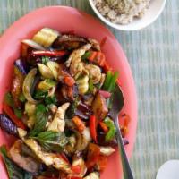 Basil Stir Fry Eggplant Chicken · Chicken, eggplant, bell pepper and Thai basil in a soy garlic bean sauce. Served with steame...