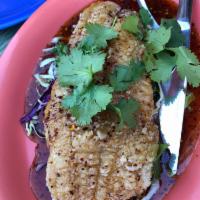 Crispy Sweet Tamarind Fish · Boneless white fish fillet dusted with garlic cornstarch, flash fried to crispy, topped with...