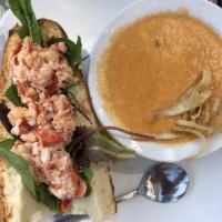 Lobster Roll · East coast favorite. Diced Maine lobster tossed in a butter and mayo mixture.Served in a hoa...