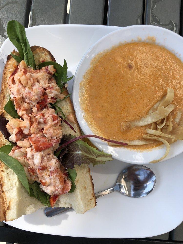 Lobster Roll · East coast favorite. Diced Maine lobster tossed in a butter and mayo mixture.Served in a hoagie bun with lettuce and a cup of our lobster bisque.