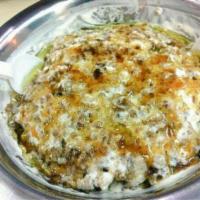 Masoob · Serves up to 3 people. Whole wheat bread and bananas, drizzled with honey and black seeds.
