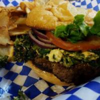 Greek Burger · 1/2 lb. hand-pattied ground beef topped with sauteed spinach and feta cheese, Greek herbs, l...