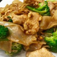 Pad See Ew · Wide rice noodles stir-fried with fried black soy sauce, egg, broccoli, and your choice of p...