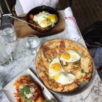 Eggs Benedict Pizza · Canadian bacon, grana padano, hollandaise, two sunny side up eggs