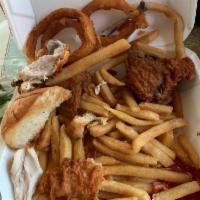 Fried Chicken Dinner · 4 pieces of fried chicken served with fries, onion rings, garlic bread and a salad. Please n...