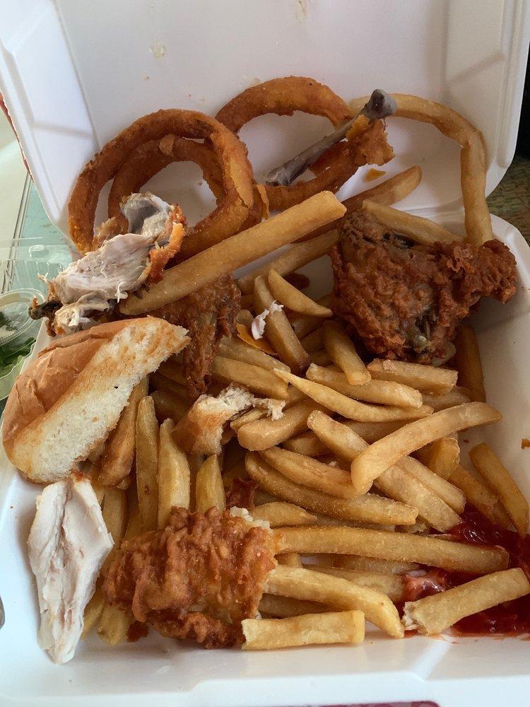 Fried Chicken Dinner · 4 pieces of fried chicken served with fries, onion rings, garlic bread and a salad. Please note dressing desired. 