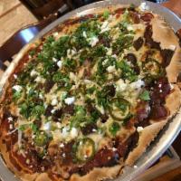 Fajita Canton Pizza · Refried beans, Mexican sauce, mozzarella cheese, beef fajita, chorizo, white onion, jalapeno...