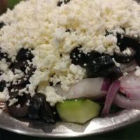 Greek Salad · Romaine lettuce, tomatoes, cucumber, red onion, black olives, feta cheese and balsamic vinai...