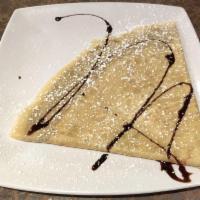 Nutella Crepe · Only Nutella spread inside the crepe , powder sugar with chocolate drizzle out side,no whipp...