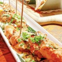 Bang Bang Shrimp · Fried shrimp pops, house sweet chili sriracha sauce, sesame seeds, scallions and cilantro le...
