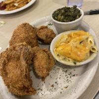 Southern Fried Chicken · Fried golden and served with choice of 2 sides.