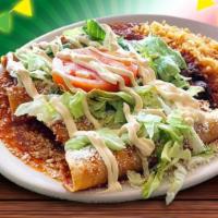 Enchiladas · 4 corn tortillas filled with chicken, steak, or cheese covered in our homemade medium-spicy ...