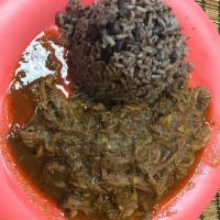 Ropa Vieja · Shredded beef in tomato sauce. Includes choice of rice and 1 side dish.