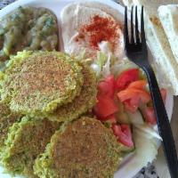 Falafel Plate · Served with salad, rice, 1 pita, and 2 sides. Falafel Mix is made in house FRESH Daily!

* a...
