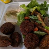 Falafel Plate · Fried ground chickpeas patties with spices, onions and parsley. Vegetarian.