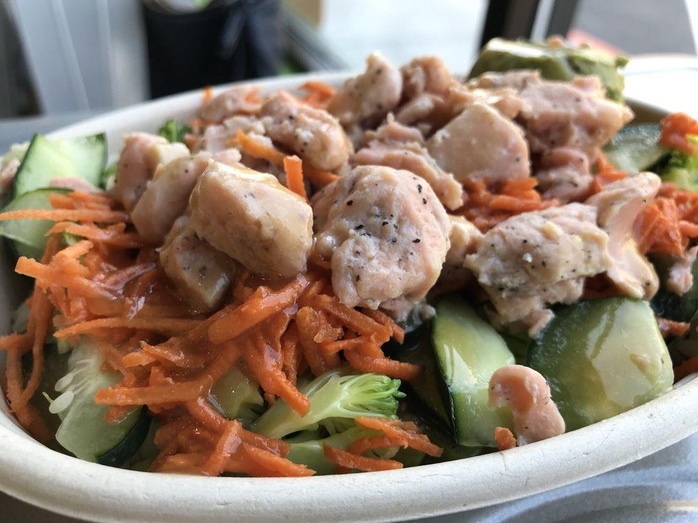 Tokyo Bay Bowl · Salmon, avocado, broccoli, carrot, cucumber, edamame, green onion, miso ginger, baby spinach or brown rice.