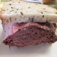Roast Beef Melt · Roast beef with melted American cheese on grilled rye.
