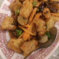 Hot Braised Fish · Deep-fried cod with green peppers, carrots, water chestnuts and black skin mushrooms in our ...