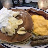 Pancake Combo · Two large pancakes, two eggs any style, two strips of bacon, two sausage links.