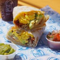 California Breakfast Burrito · Scrambled eggs, bacon, cheddar cheese, home fries and fresh avocado wrapped in a flour torti...