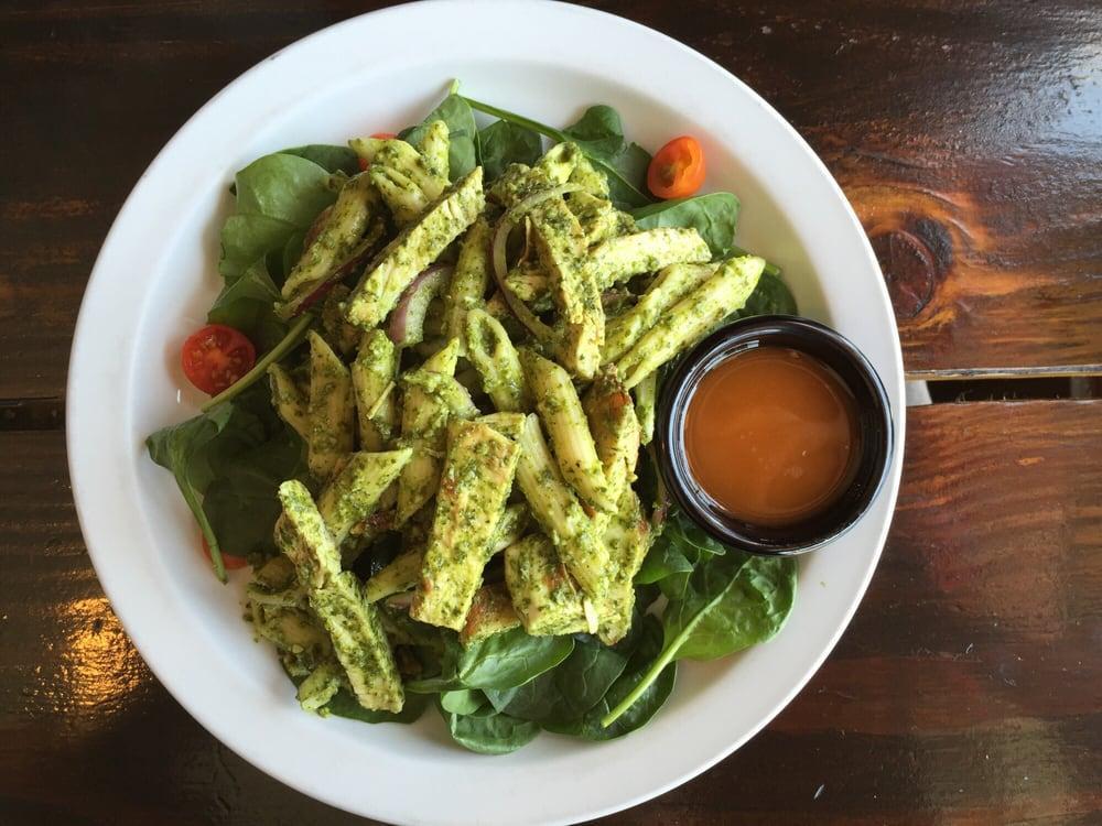 Chicken Pesto Salad · A wonderful salad with penne pasta, chicken, tomatoes, fresh spinach, red onions, tossed in our special pesto lemon dressing.