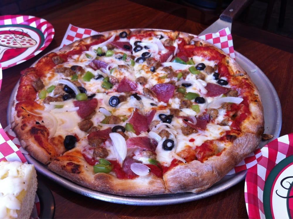 Mamma Rosa Pizza · Sausage, salami, olives, bell peppers and onions.