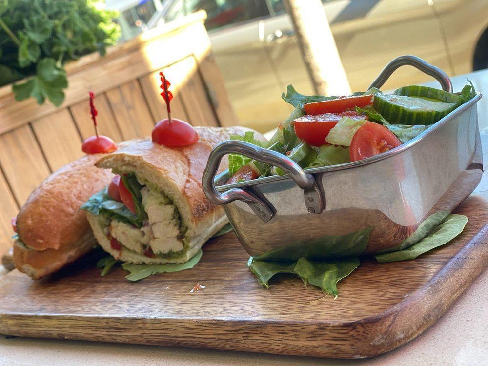 Pesto Chicken Sandwich · You will love our special pesto sauce. Grilled chicken breast, mozzarella cheese, fresh tomatoes, spinach, sun dried tomatoes and onions with pesto sauce. Served on choice of bread with choice of side.