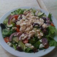 Greek Salad · Romaine lettuce, red onions, tomatoes, cucumber, and feta cheese in vinaigrette dressing wit...