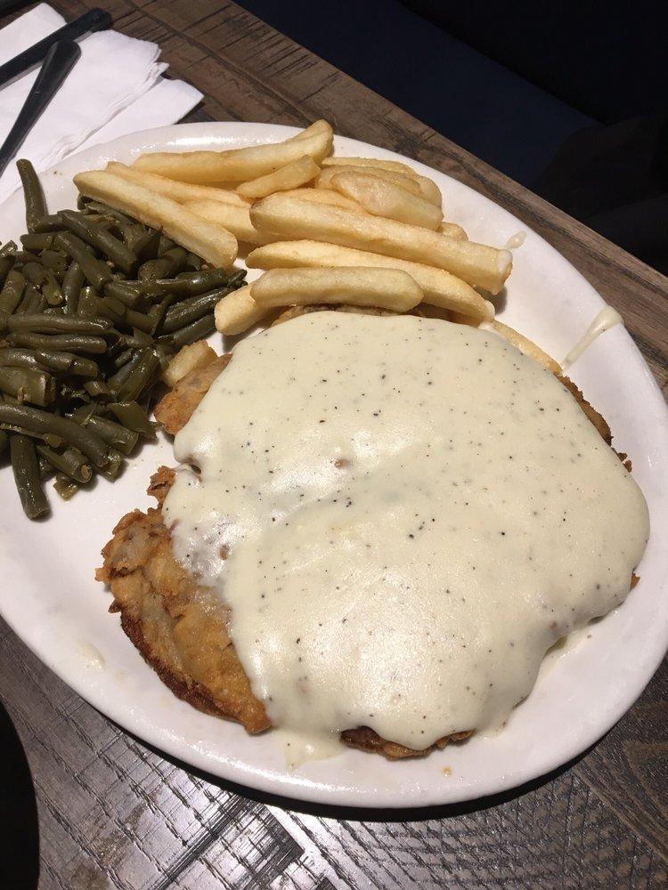 Chicken Fried Steak · Alamo Cafe favorite. Our Texas-style serving of fresh tender beef, specially battered, fried golden brown, and covered in cream gravy. Served with choice of two sides.
