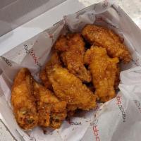 Honey Garlic Wings · -fried wings marinated with honey and garlic sauce, that is sweet, bold and crunchy