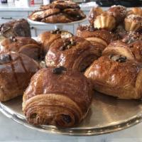 Chocolate Croissant · Flaky and buttery chocolate croissant. Pain au chocolate.