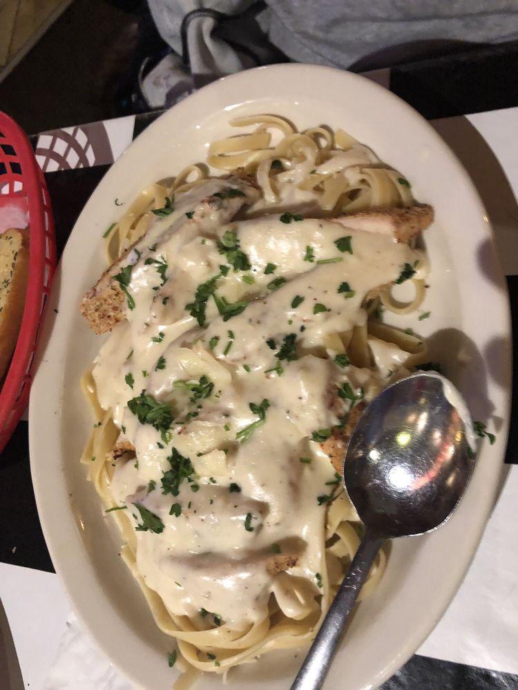 Chicken Fettuccine Alfredo · Lightly breaded baked chicken breast served over a bed of fettuccine topped with creamy Alfredo sauce.