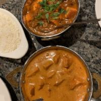 Chicken Tikka Masala · Oven-roasted chicken white meat cooked in a special creamy
tomato, onion sauce with spices