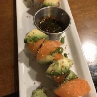 Double Salmon Roll · Spicy crunchy salmon inside. Topped with salmon, avocado and topped with scallion, sesame an...