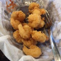 Popcorn Shrimp · Bite sized pieces of shrimp that have been deep fried. 