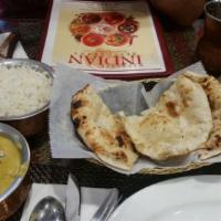 Chicken Korma · Boneless chicken cooked with saffron, creamy almond sauce and pineapple raisins. Mughlal sty...