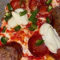 New Yorker Pizza · Winner, best traditional in the world, Las Vegas. Mozzarella, house link sausage, garlic, pe...