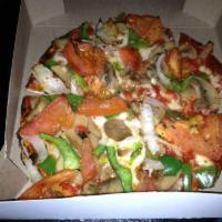 Veggie Pizza · Tomatoes, onions, green peppers and mushrooms.