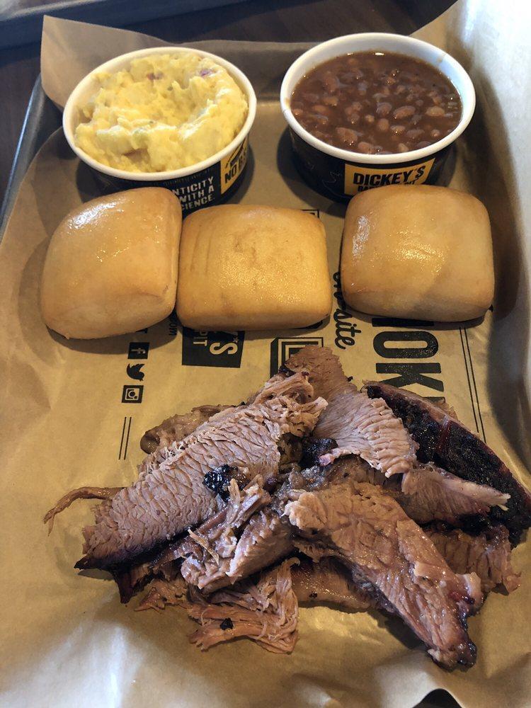 Brisket Plate · Slow smoked Brisket sliced or chopped, served with 2 sides and a roll