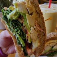 Power Breakfast Sandwich · Grilled sliced chicken breast, cage-free egg whites, baby spinach, tomato, red onion, and ch...
