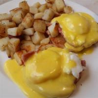 Traditional Eggs Benedict · Starts out with our baked ham topped poached eggs and Hollandaise sauce on an English muffin...