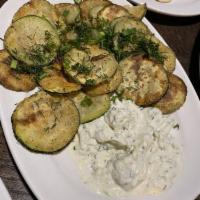 Fried Zucchini Chips · Tossed in sea salt with a side of tzatziki.