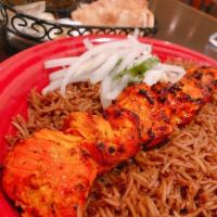 Chicken Kebab · Boneless chicken breast, marinated in our special seasonings and saffron, grilled to perfect...