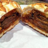 BBQ Beef Sandwich · Thinly sliced roast beef served with BBQ sauce.  Bread and cheese of your choice. 