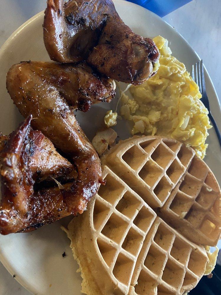 Smoked Chicken Wings and Waffle · Smoked chicken wings, 2 eggs any style and a Belgian waffle.