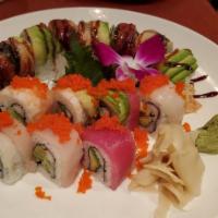 Dragon Roll · Inside: Avocado, crabcake On top: eel, masago, and eel sauce