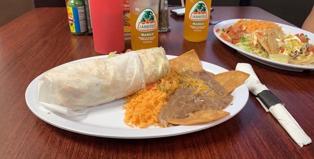 Burrito Combo · Regular burrito of your choice of meat ,serve with rice, refried beans garnished with cheese and tortilla chips, lettuce and pico de gallo