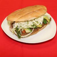 Torta · Sandwich Served with Beans, Cheese, Lettuce, Avocado, Tomatoes, Onions, Mayonnaise, and Jala...